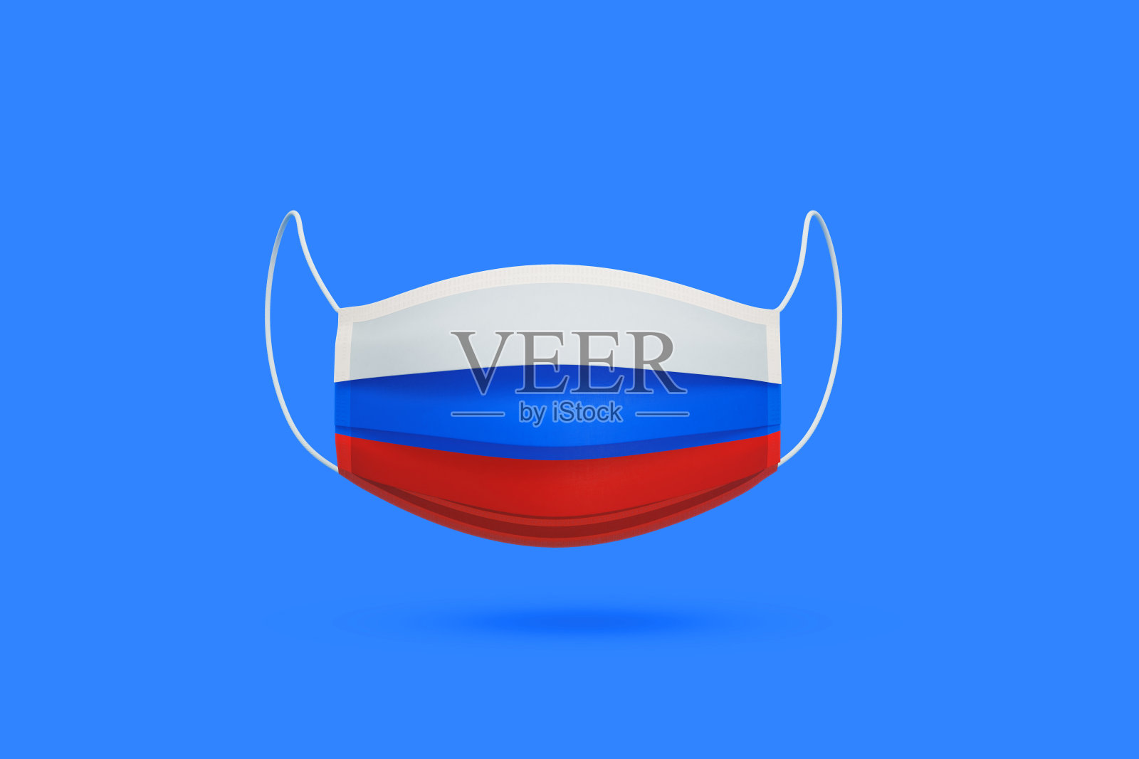 外科口罩纹理与俄罗斯国旗在蓝色背景照片摄影图片