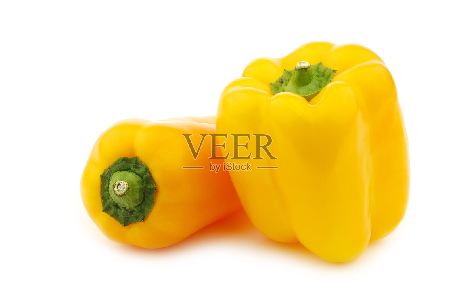 两个新鲜黄甜椒(辣椒)照片摄影图片