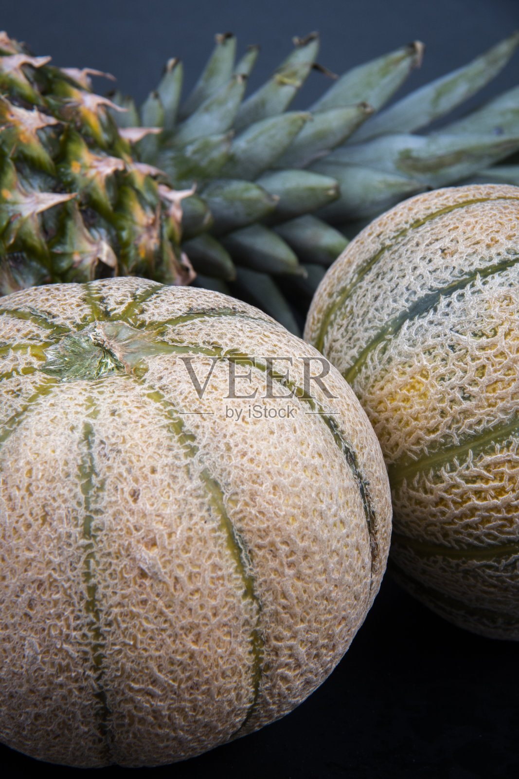 菠萝和哈密瓜照片摄影图片