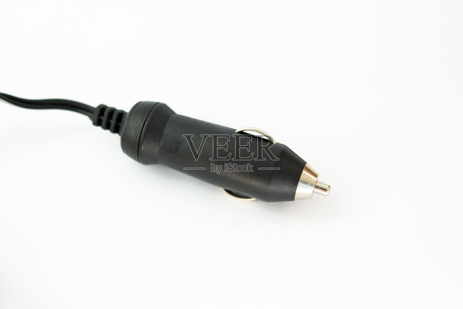 在白色背景上给打火机充电照片摄影图片