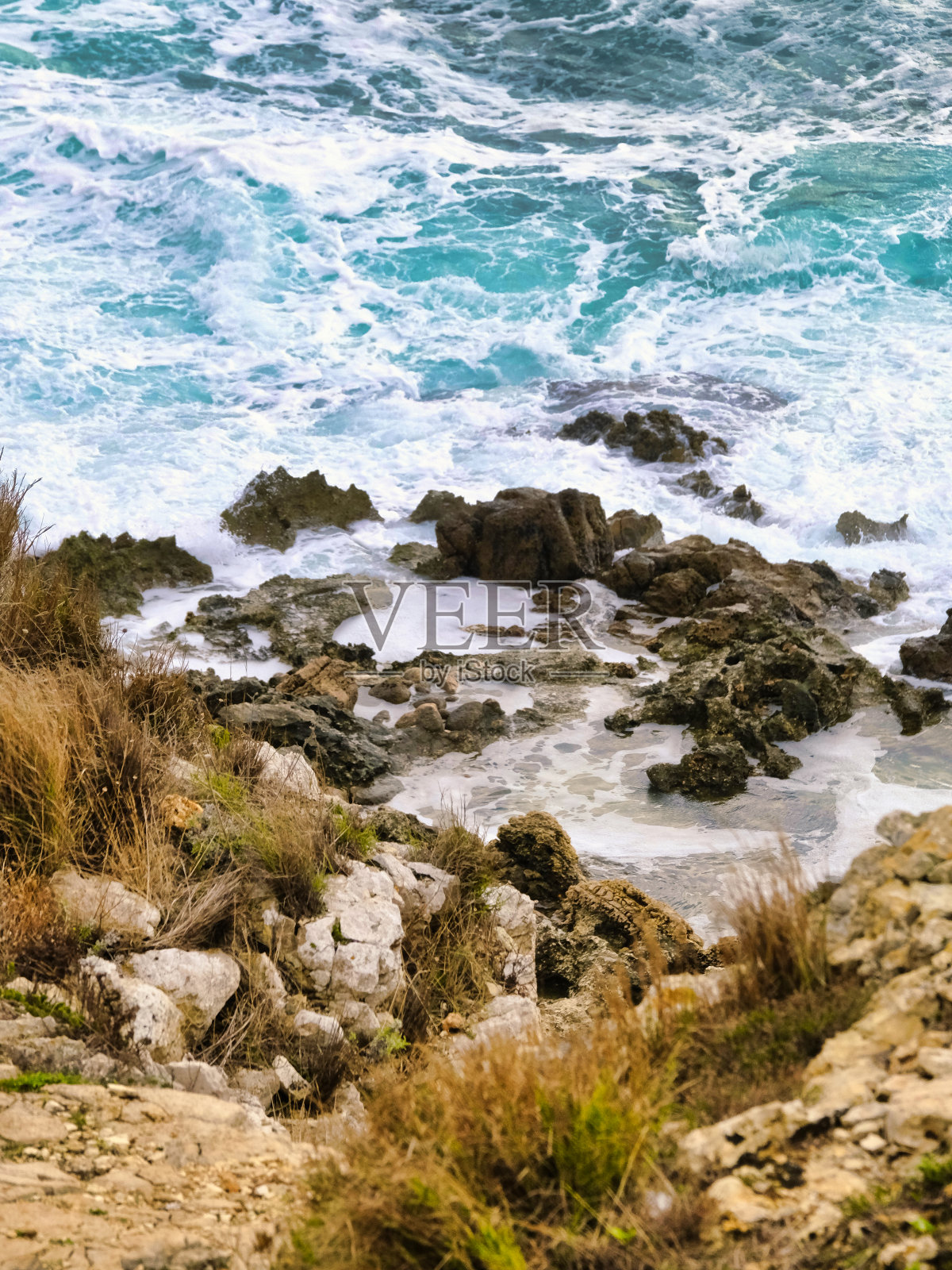 爱奥尼亚海海景景观,冬季日落,海浪,岩石,风暴照片摄影图片