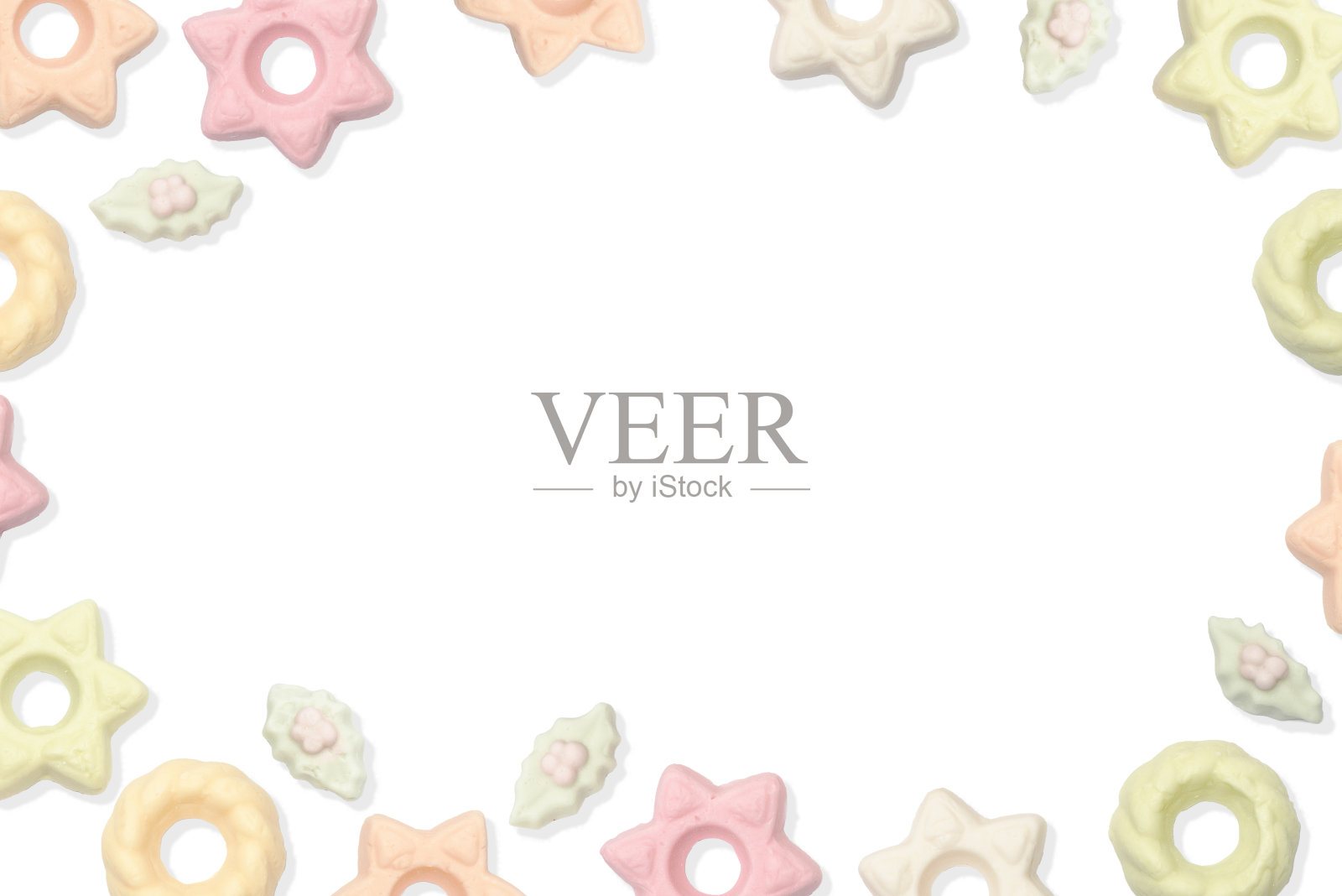 多种颜色的绿色/橙色/白色和粉红色的圣诞糖果躺在一个模式照片摄影图片