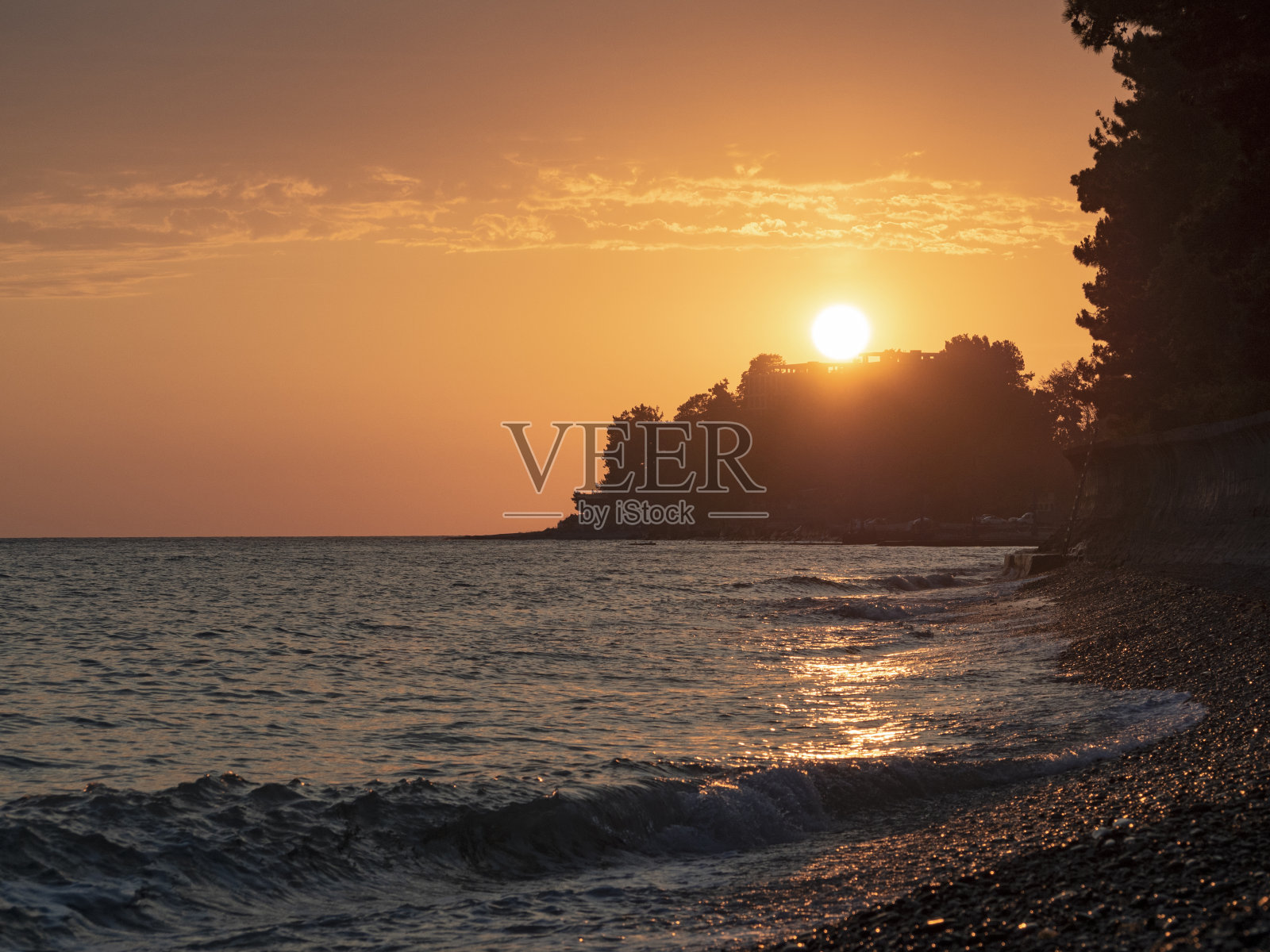 海滩的日落照片摄影图片