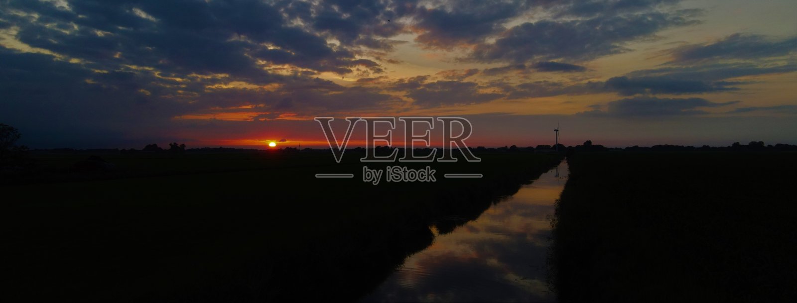 7月日落照片摄影图片