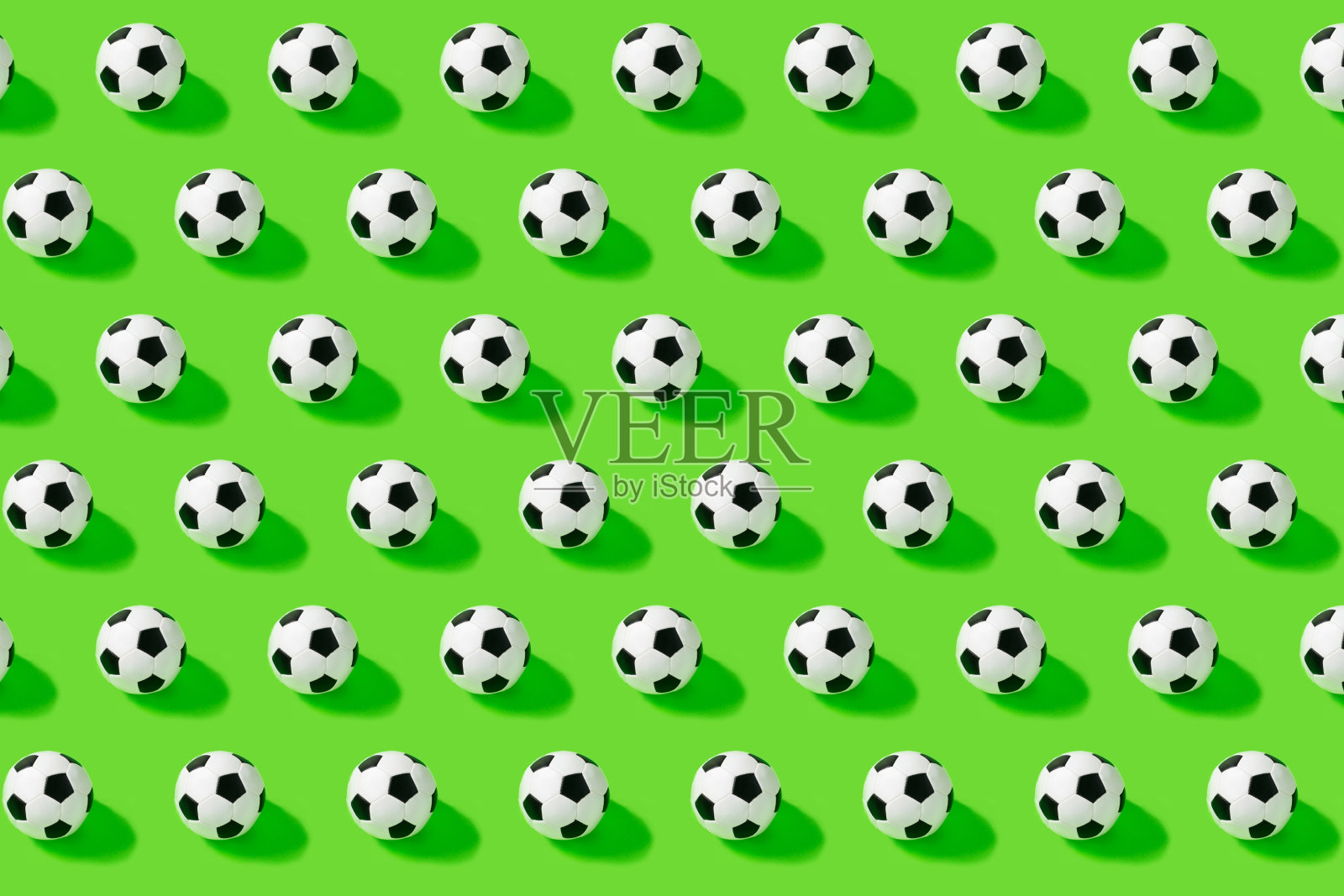 模式。绿色背景上的足球。游戏,比赛照片摄影图片