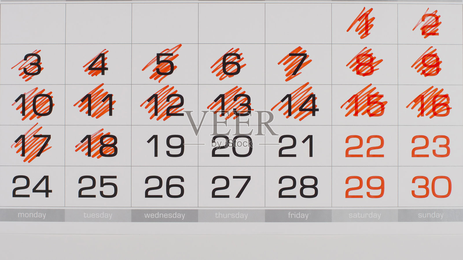 TOP VIEW:删除(红色标记)日历中的数字照片摄影图片