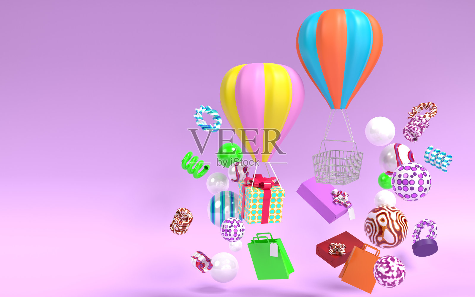 紫色背景上的热气球载着礼盒和购物袋照片摄影图片