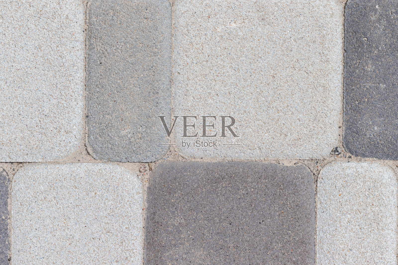 室外混凝土地砖背景纹理为不同深浅的灰色照片摄影图片