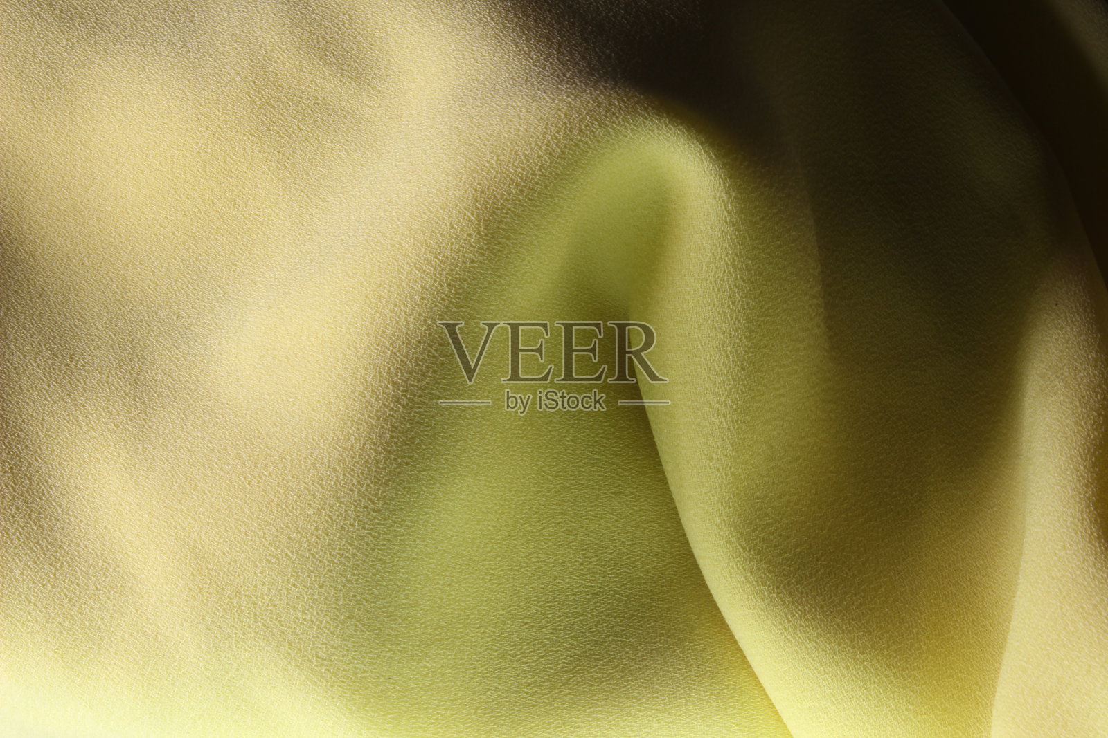 抽象的黄色织物纹理背景照片摄影图片