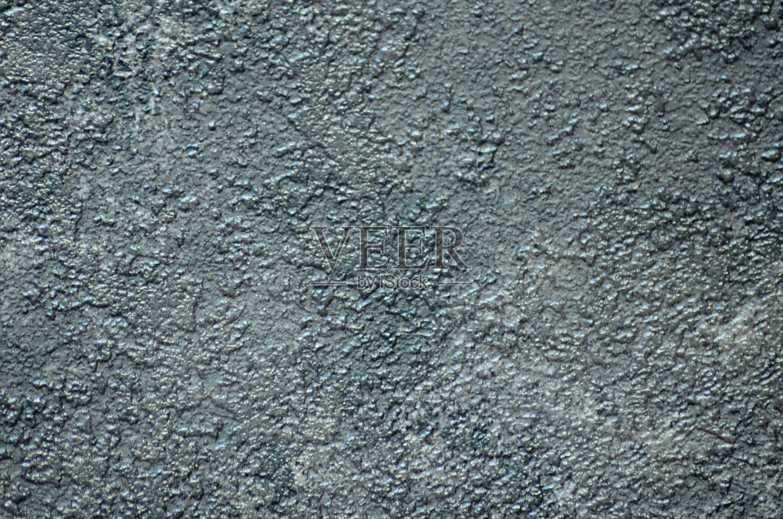 黑色木炭,一种天然矿物的特写纹理,覆盖着裂缝和斑点。照片摄影图片