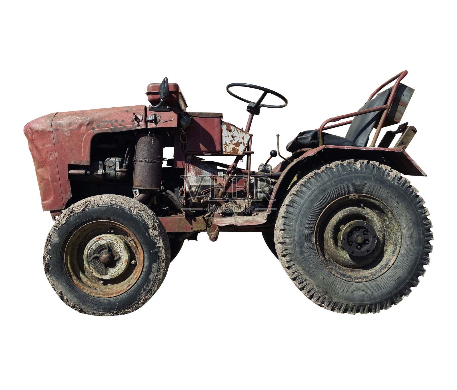 在孤立的白色背景上,一台自制的旧拖拉机照片摄影图片