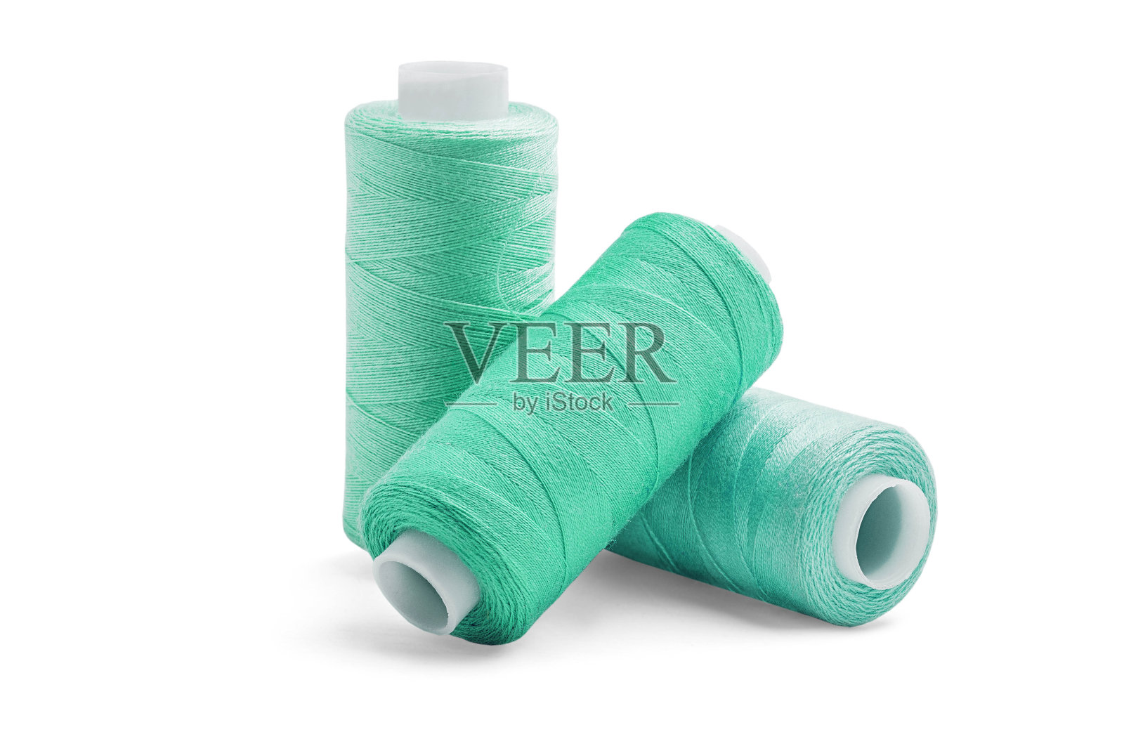 在白色的背景上缝线。照片摄影图片