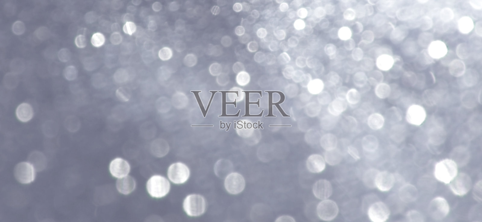 闪亮的银色节日散景背景照片摄影图片