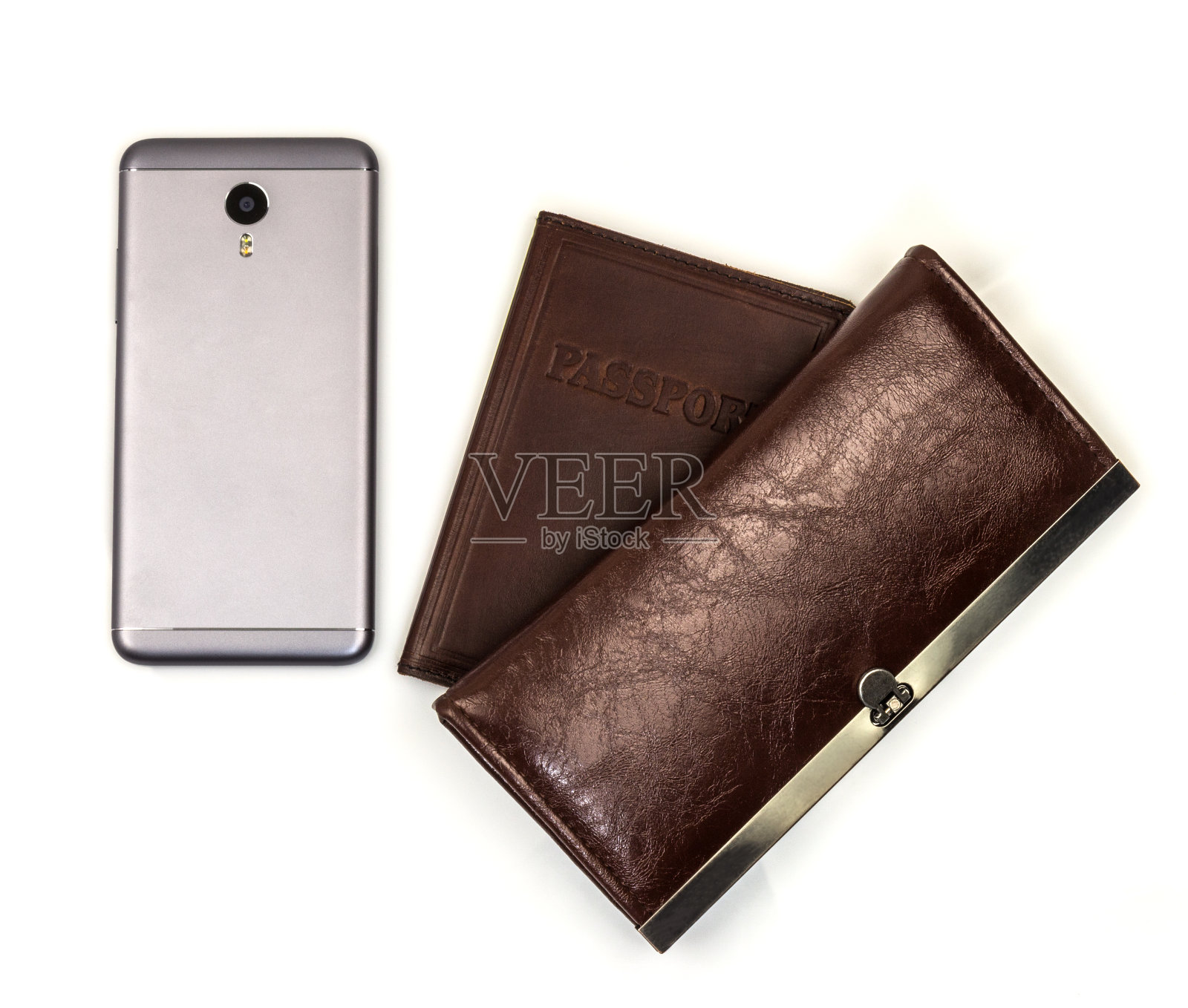 灰色手机,皮夹和护照照片摄影图片
