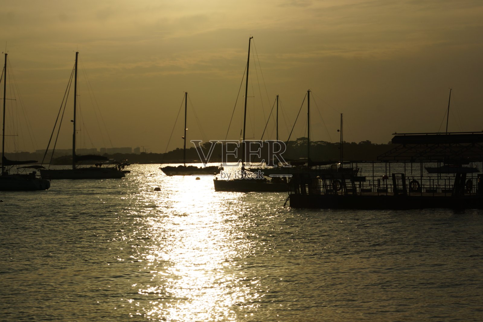 日落在海岸照片摄影图片