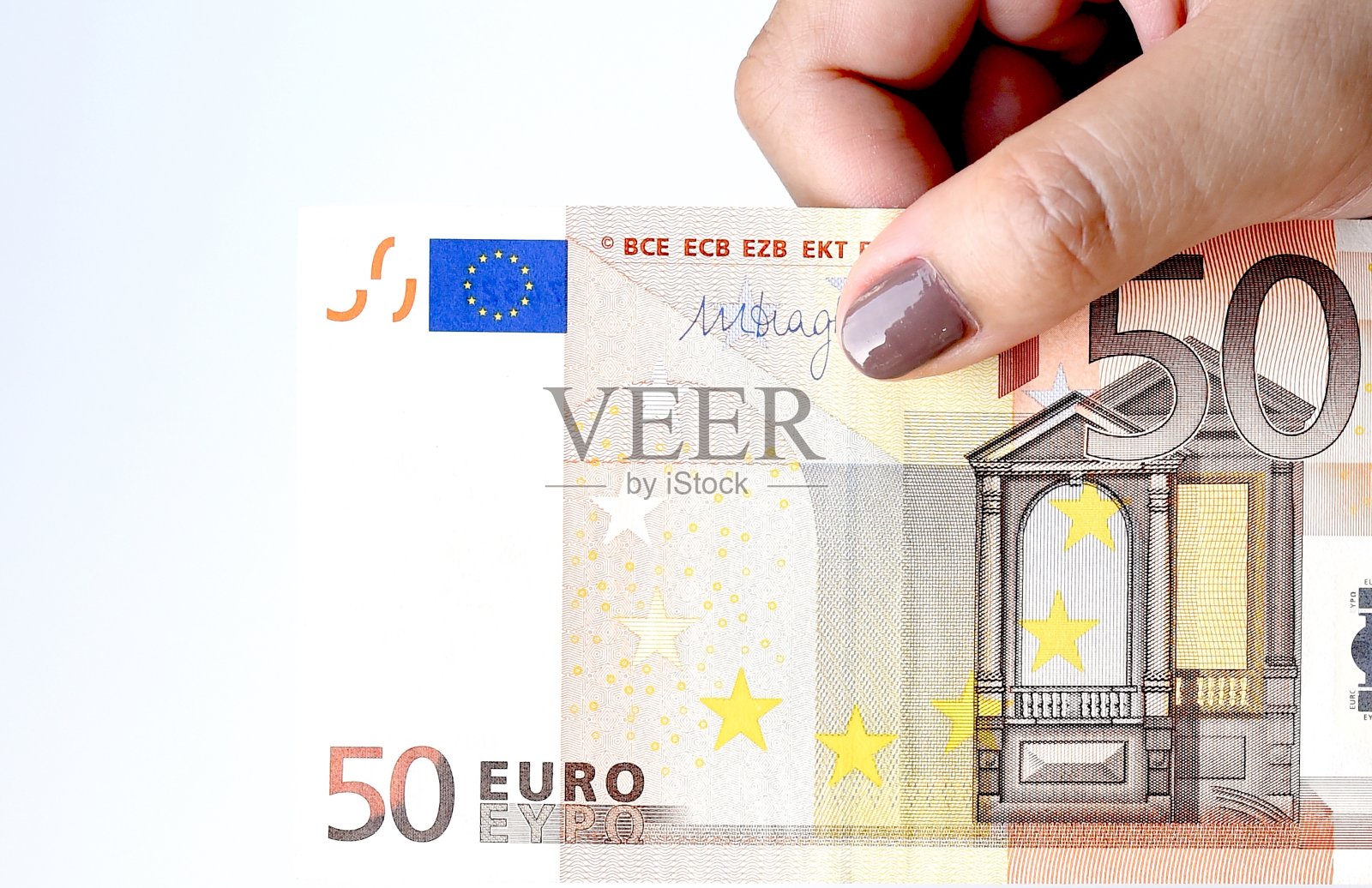 近距离的钞票在手边照片摄影图片