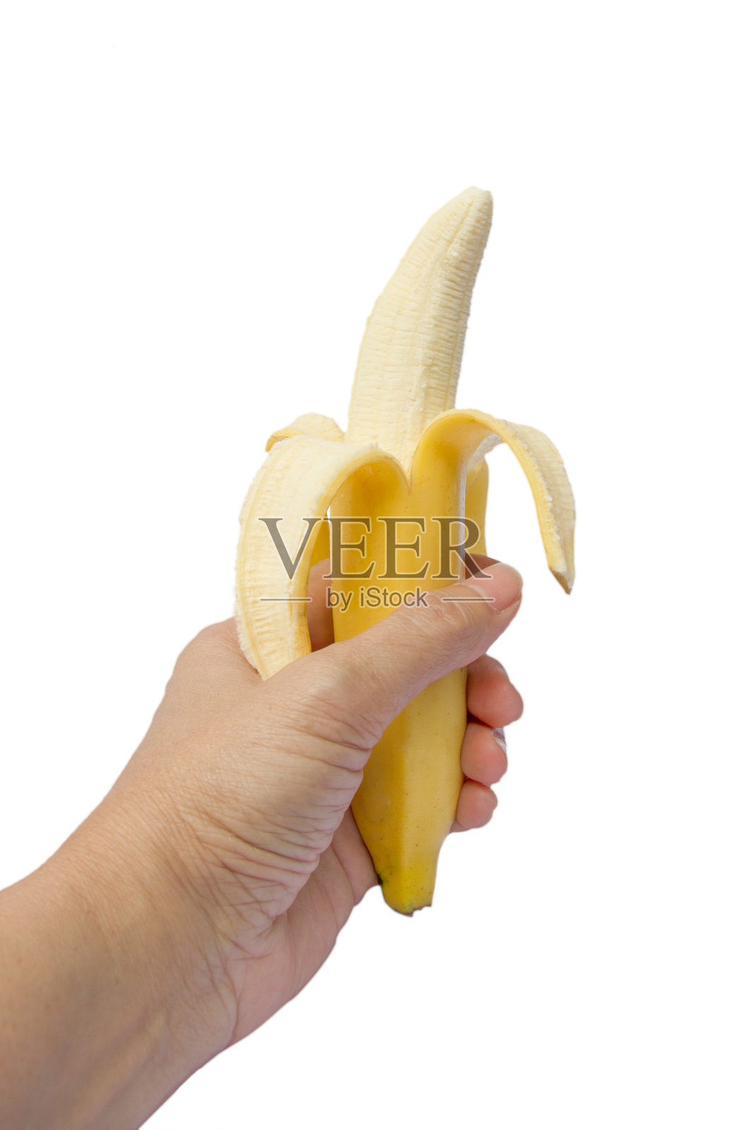 人的手拿着剥了皮的香蕉照片摄影图片