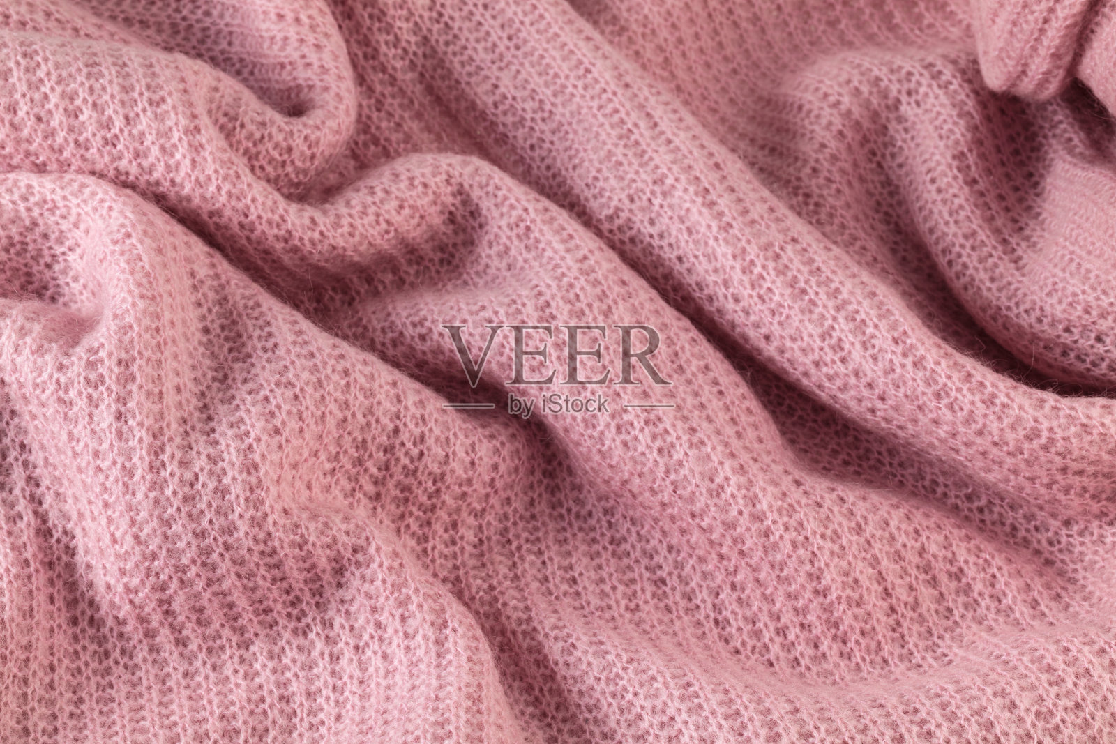 针织质地。羊毛制的花纹织物照片摄影图片