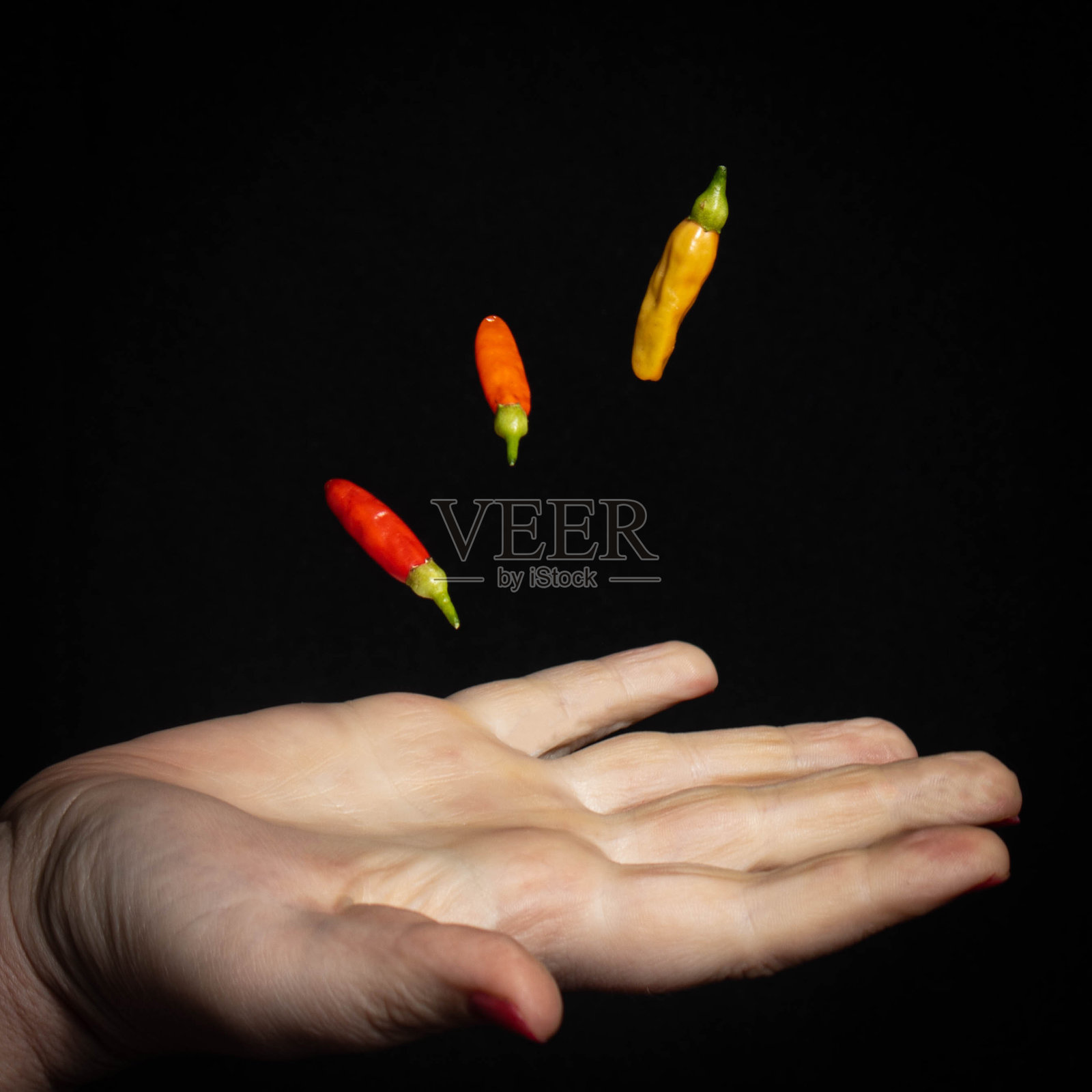 捕捉辣椒照片摄影图片