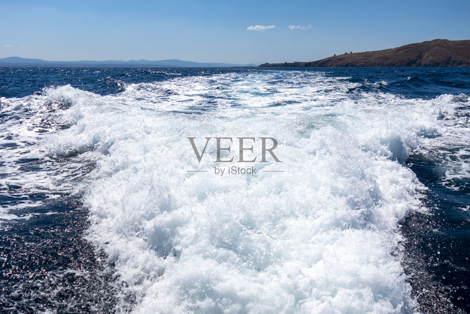 快艇上的波浪照片摄影图片