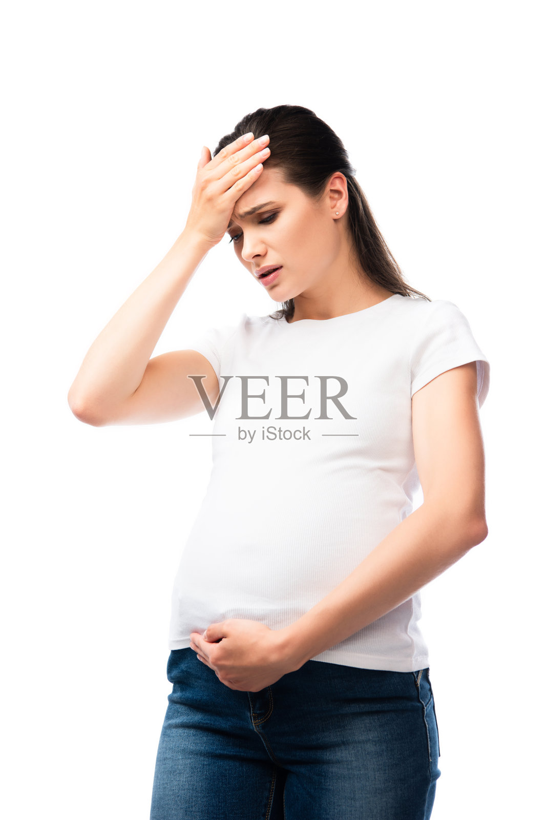 精疲力竭的孕妇穿着白色t恤抚摸着孤立的头部照片摄影图片
