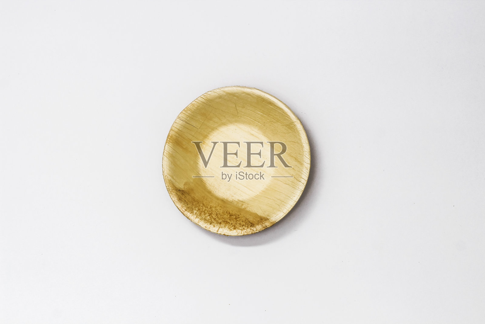 圆槟榔叶碗,环保一次性餐具。照片摄影图片