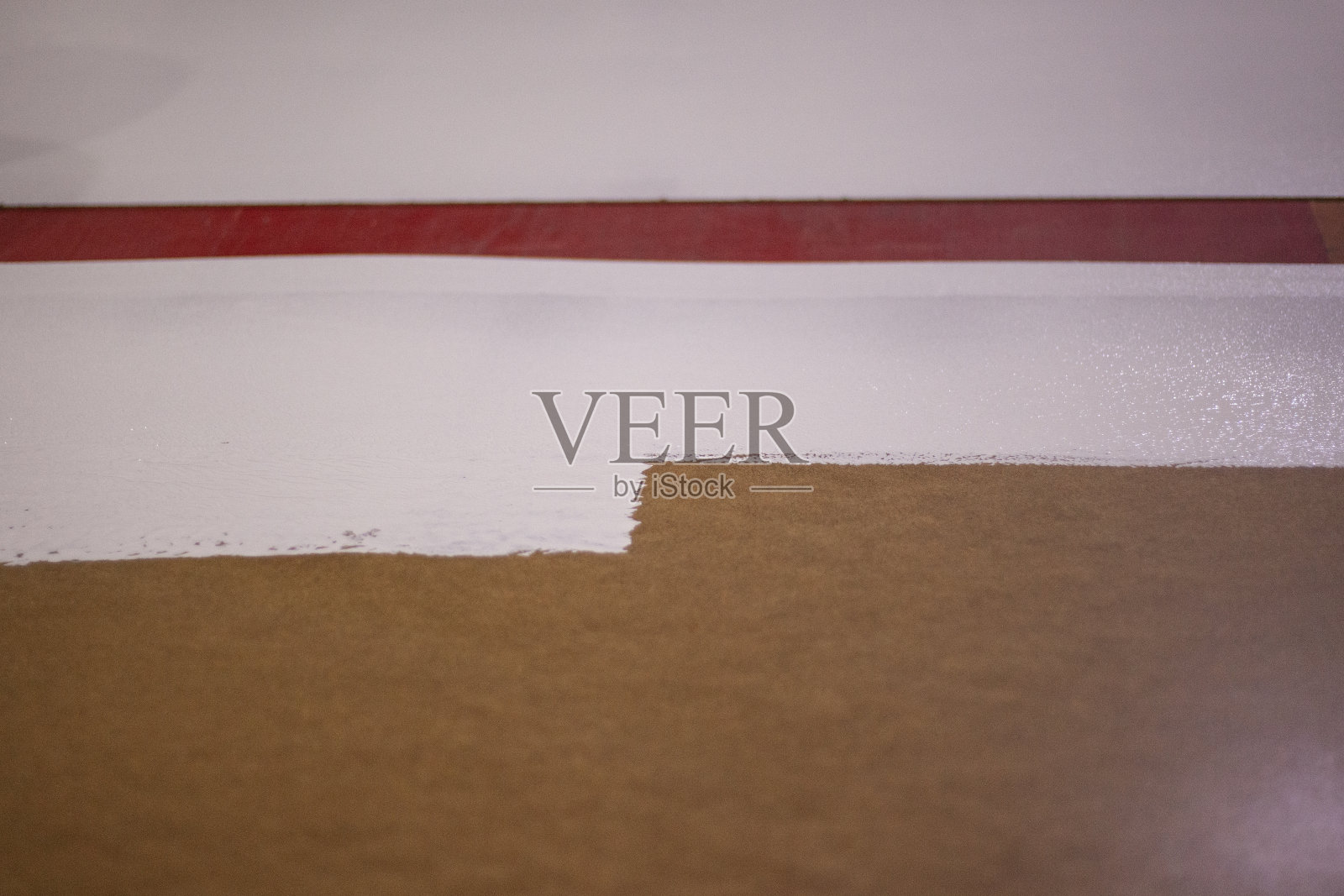 用白漆漆板。工作辊照片摄影图片