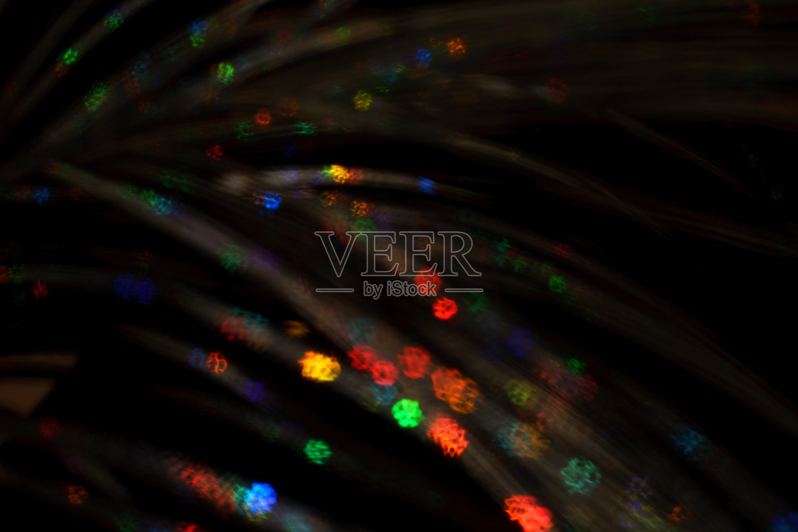 圣诞节的背景。节日抽象背景与散焦灯光和星星照片摄影图片