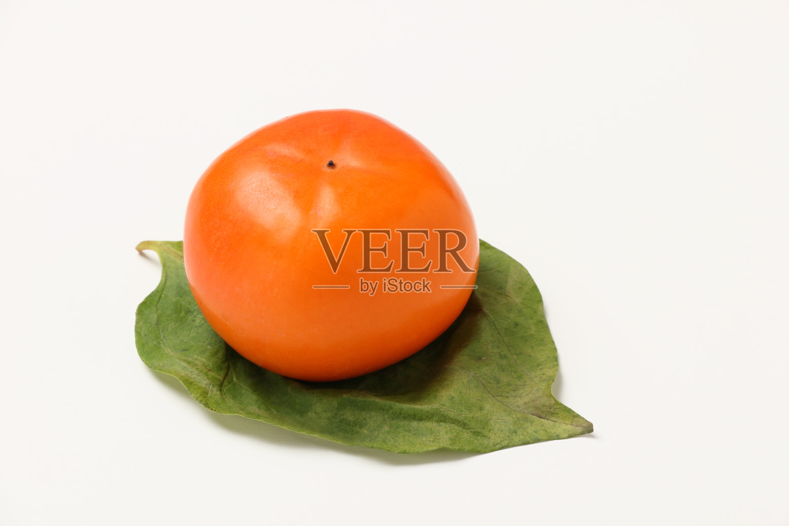 白底上的柿子照片摄影图片