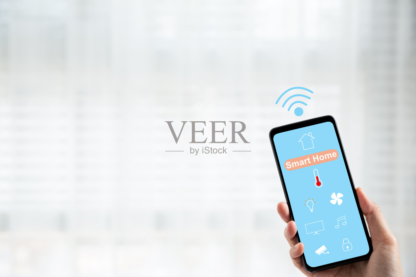 手持手机与智能的主屏幕照片摄影图片