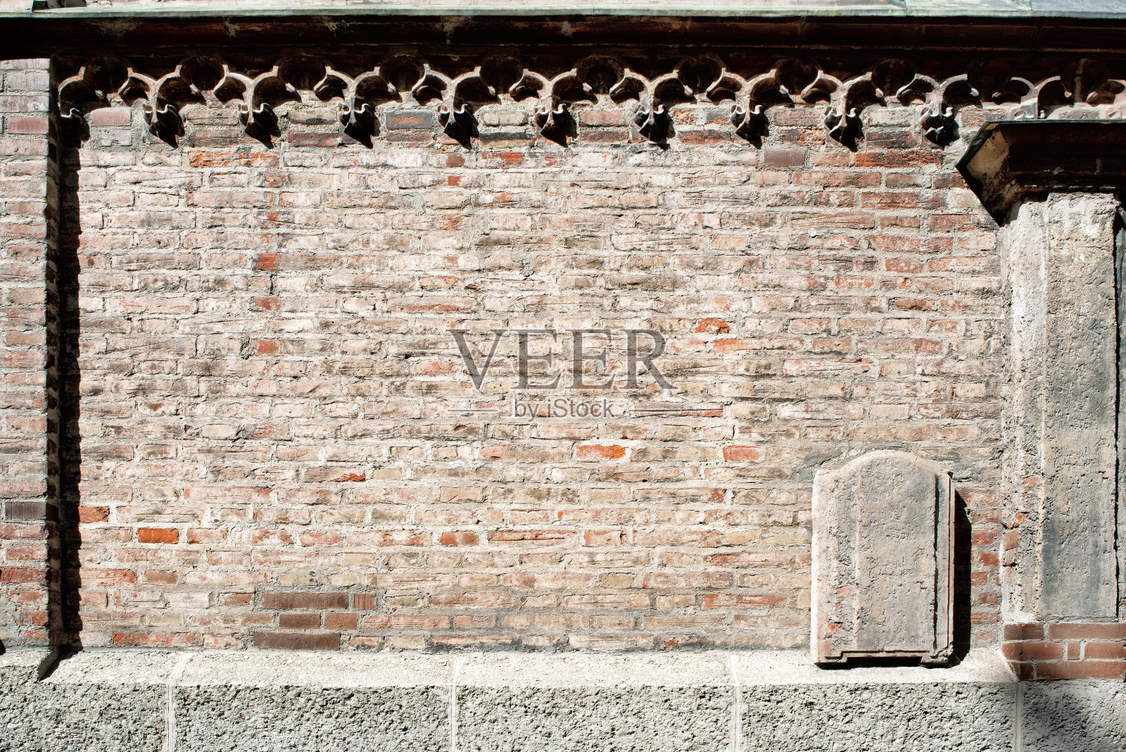 一堵旧砖墙。照片摄影图片