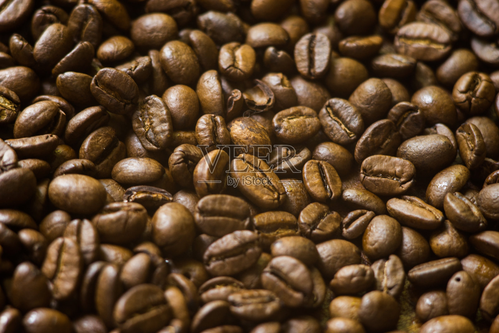 咖啡豆的背景。烘焙咖啡豆的背景照片摄影图片