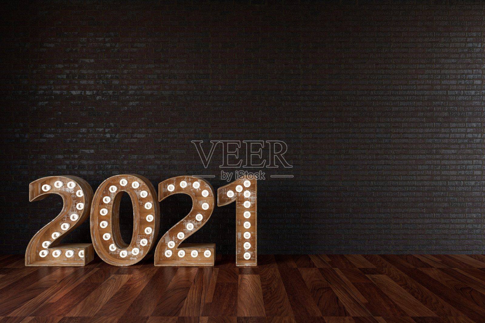 黑色砖墙上的2021个灯泡标识照片摄影图片