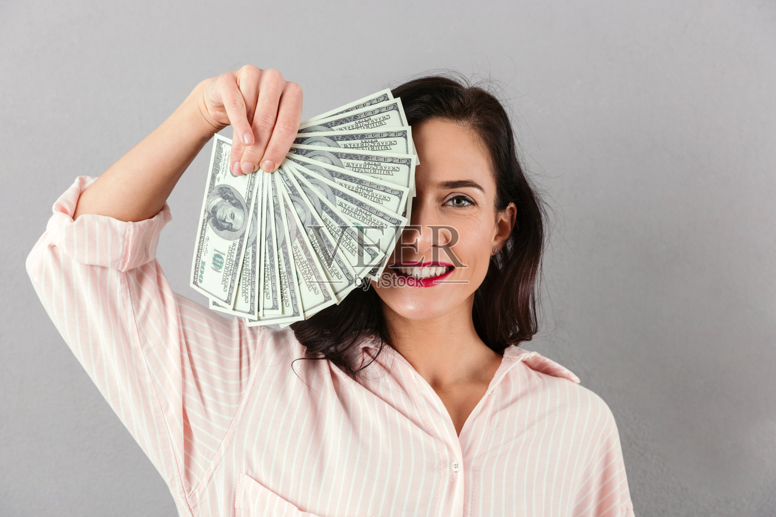 一个快乐的女商人的特写照片摄影图片