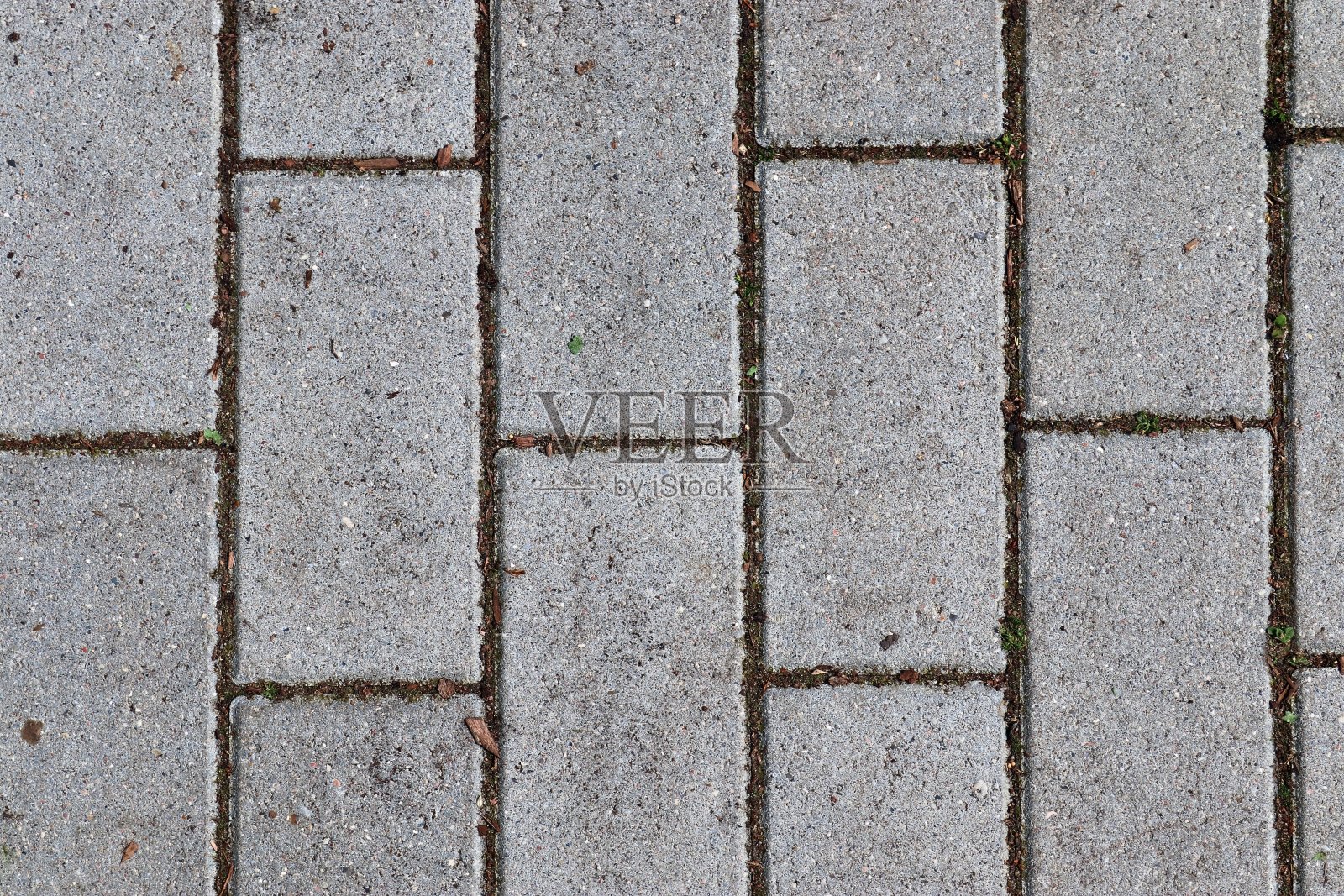 对古老的历史鹅卵石道路和人行道的详细特写照片摄影图片