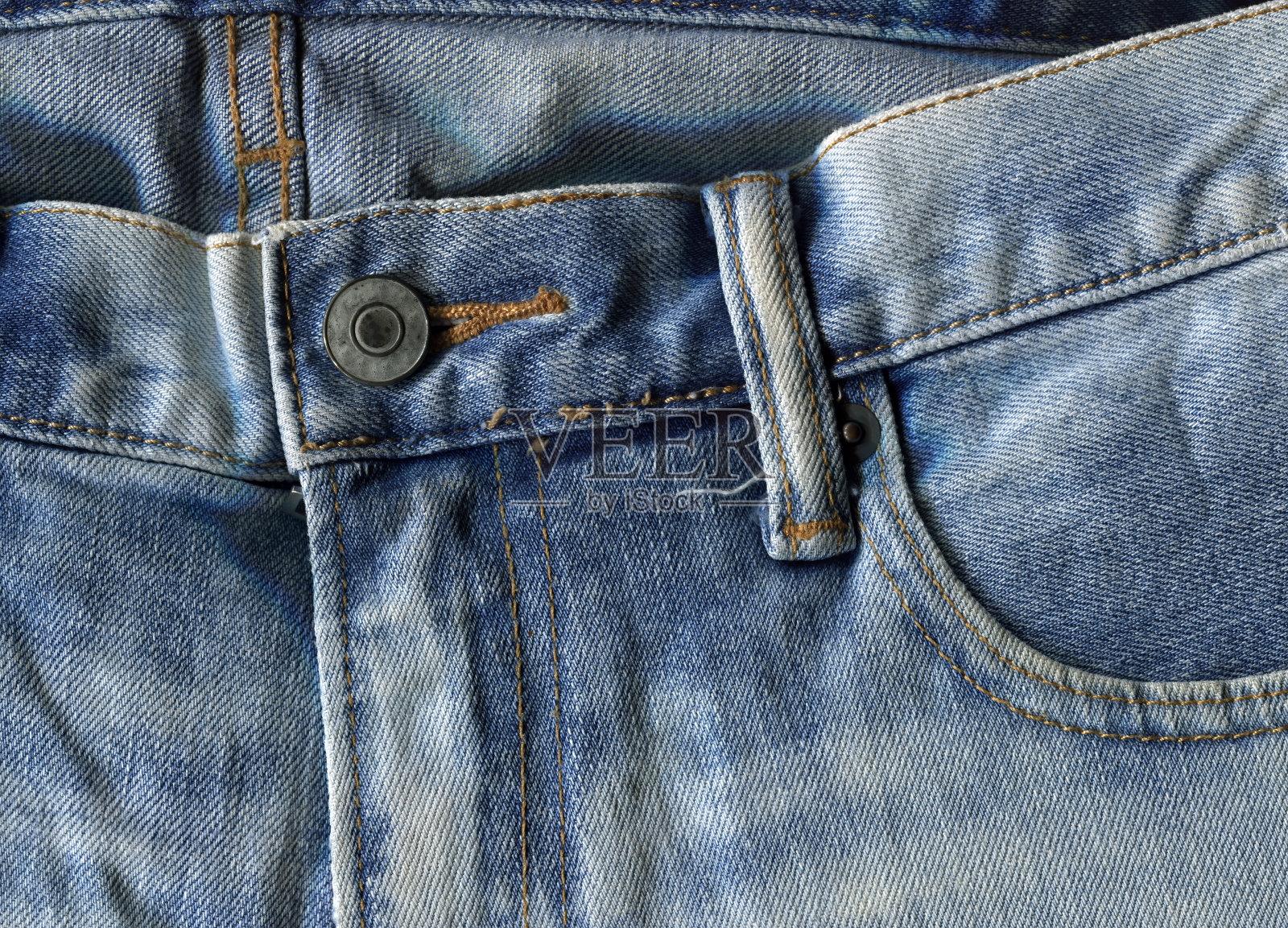 蓝色牛仔裤裤子,牛仔牛仔裤背景。有选择性的重点。照片摄影图片