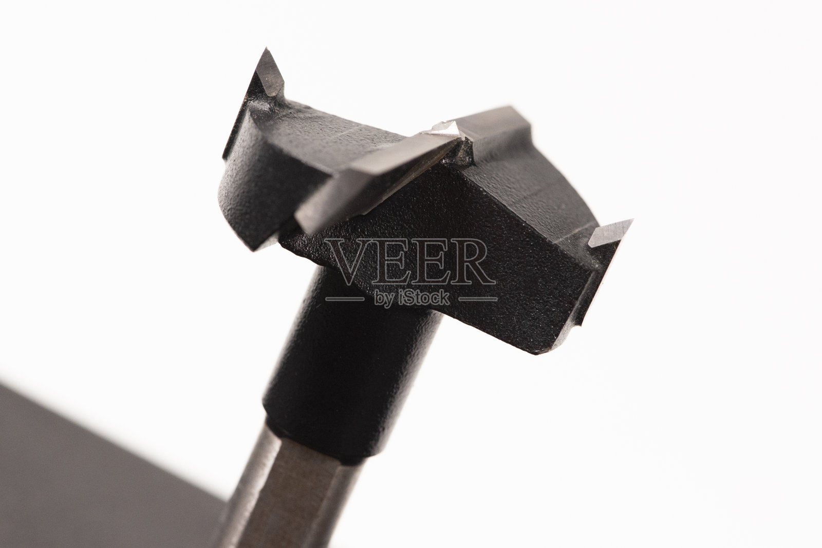 钻头Forstner在白色背景。宏照片摄影图片