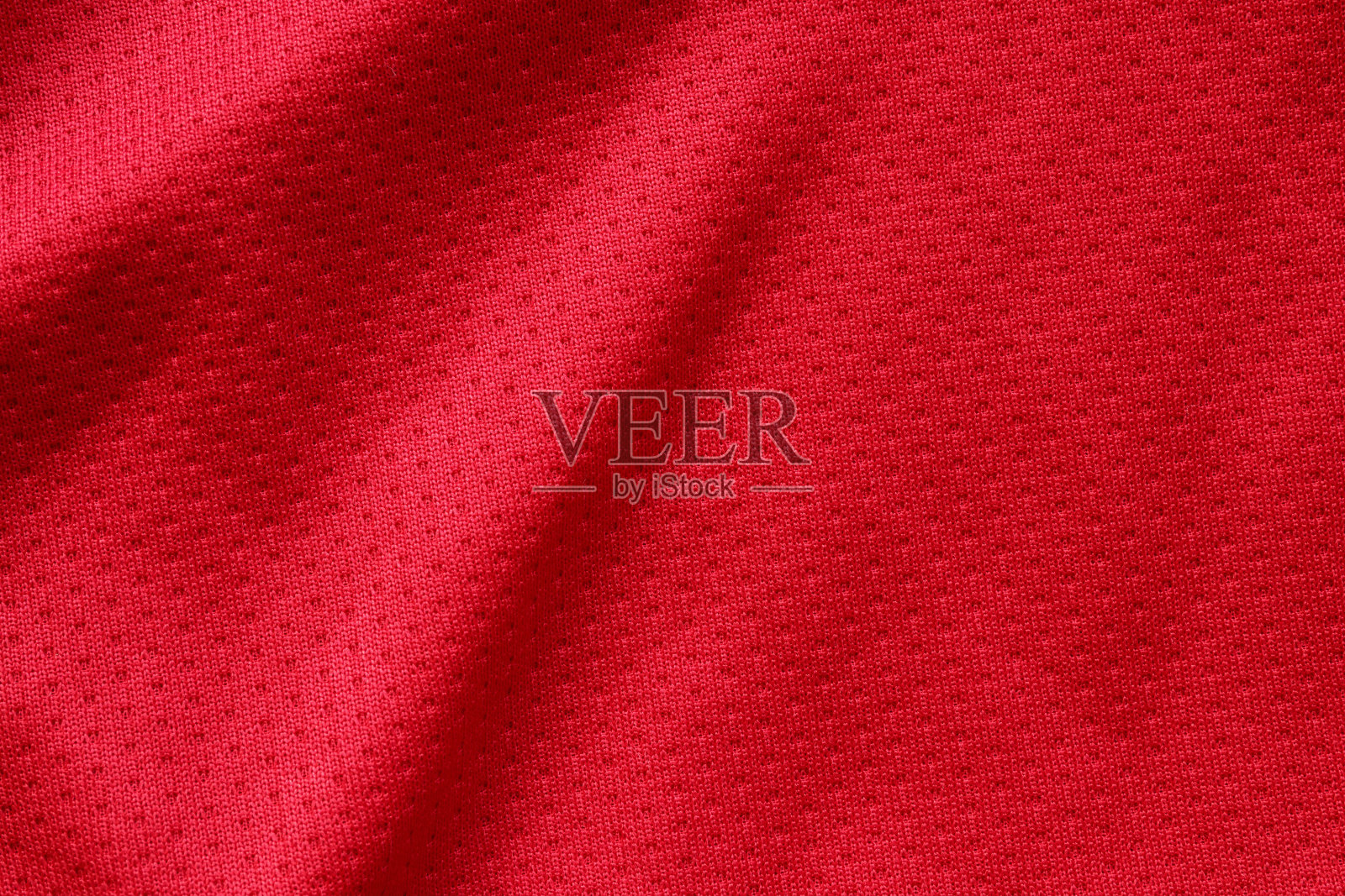 红色运动服面料足球衫运动衫纹理近照片摄影图片