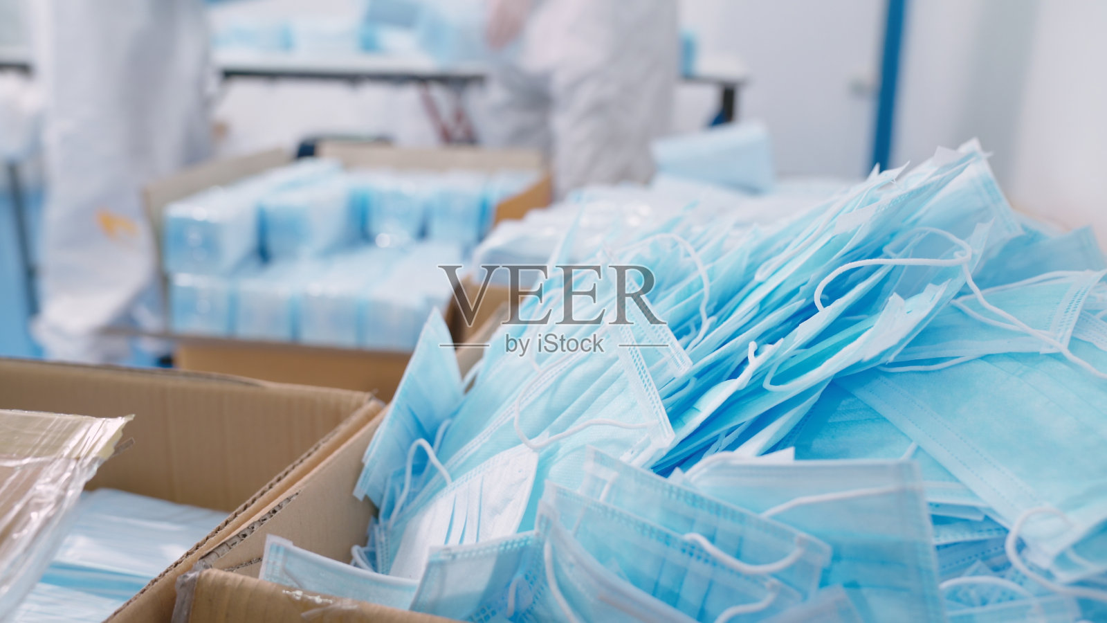 现代化的口罩生产线工厂照片摄影图片