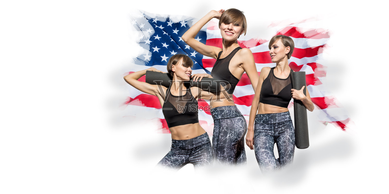 年轻女子与健身垫享受和领导健康的生活方式在白色背景和挥舞美国国旗照片摄影图片