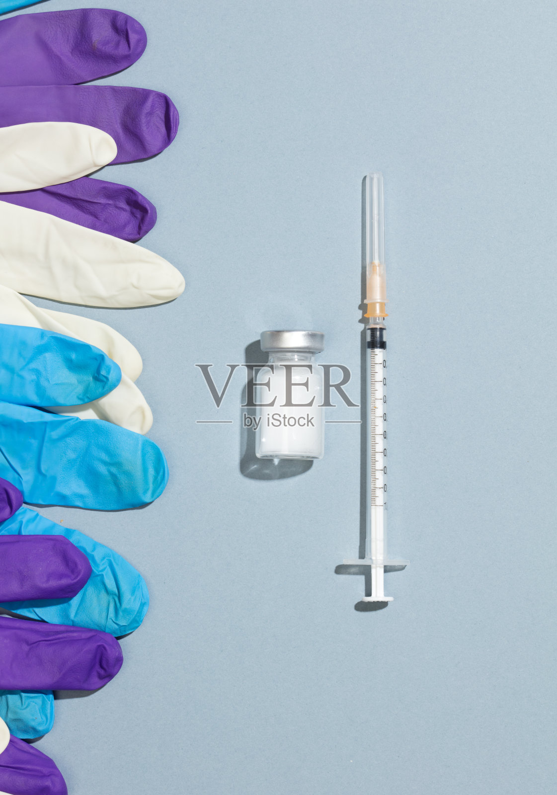 接种疫苗和免疫接种概念注射器,安瓿,彩色手套照片摄影图片
