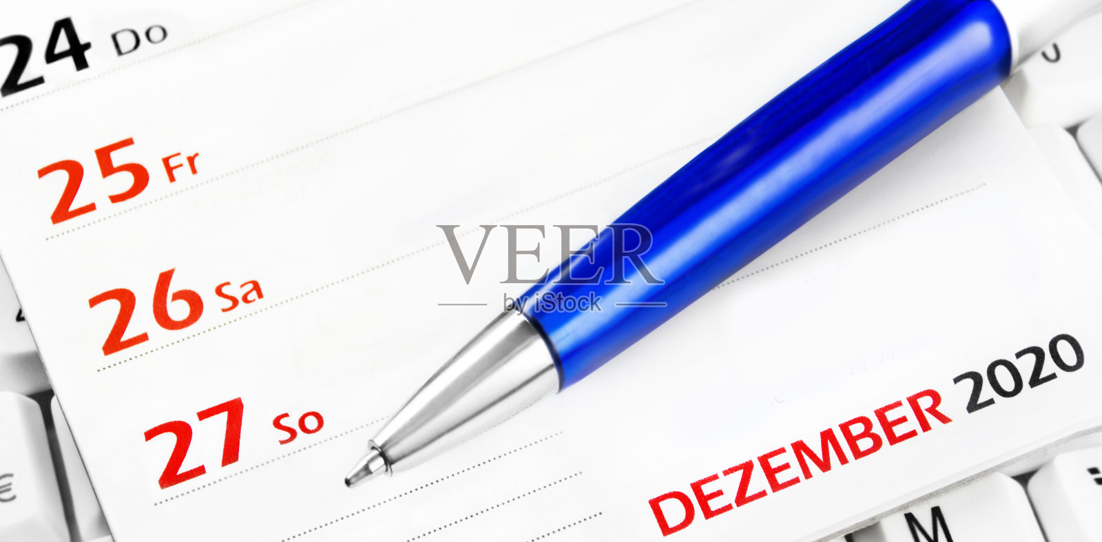 圣诞假期背景与笔照片摄影图片