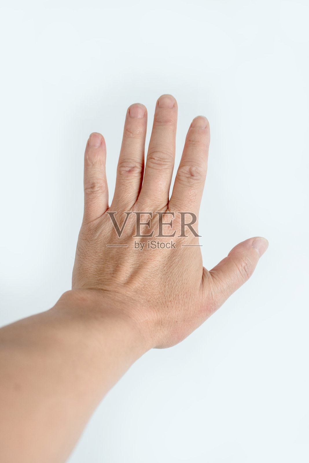 一个人的手掌伸出来照片摄影图片