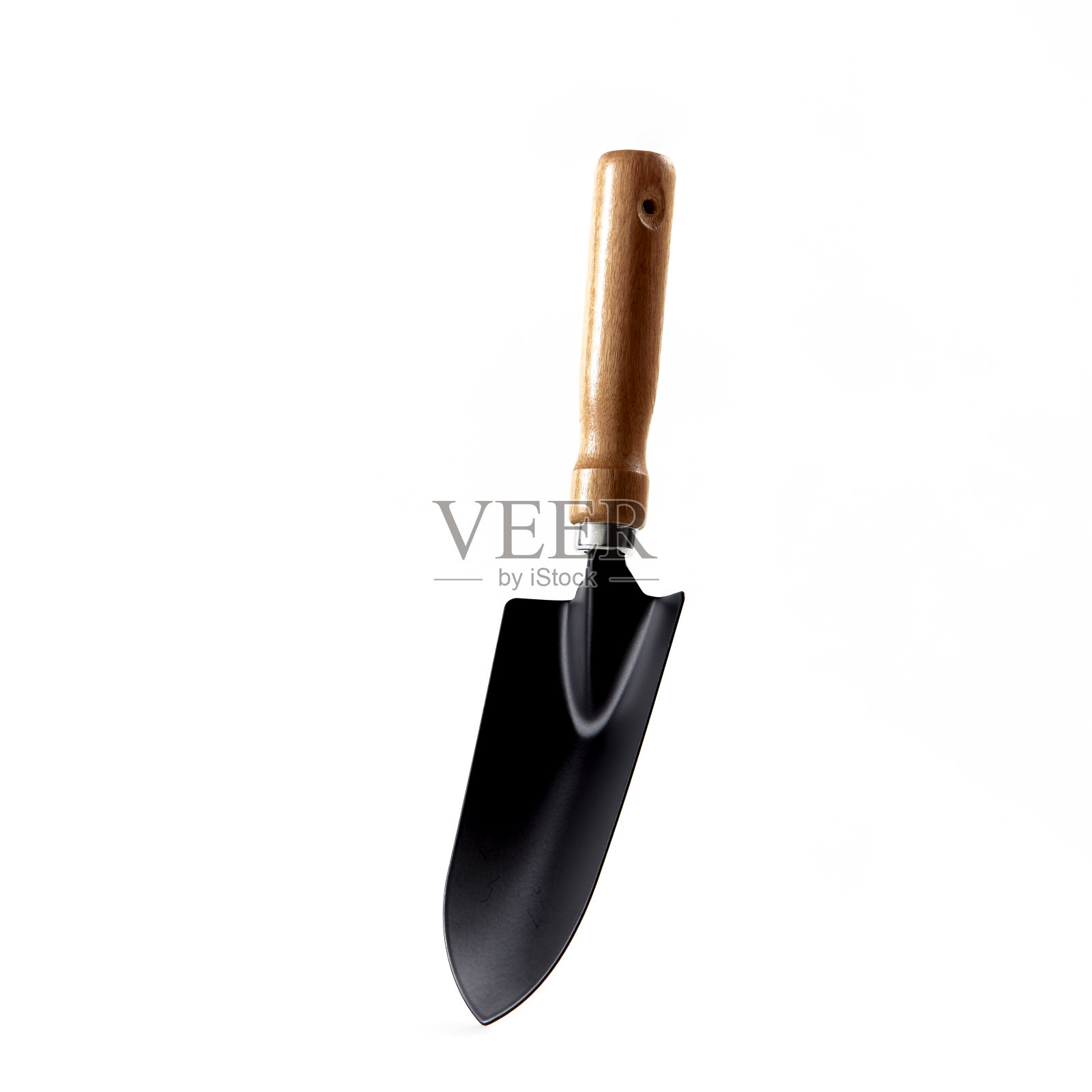 在白色背景上铲园艺照片摄影图片