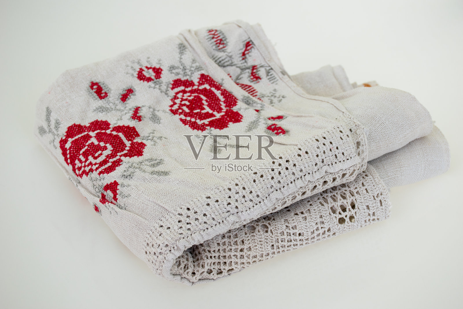 复古的绣花织物在白色的背景照片摄影图片