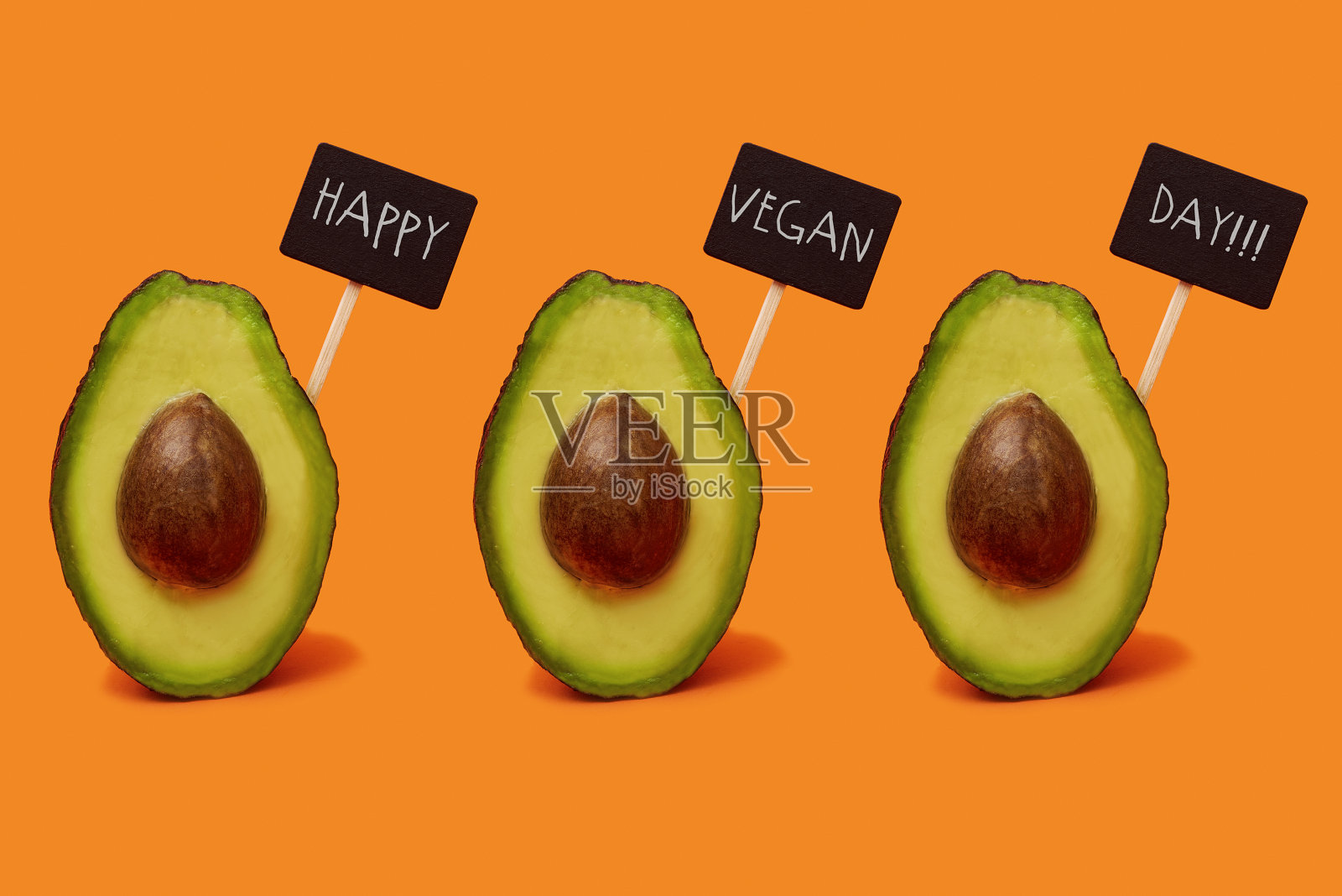 牛油果和短信祝素食日快乐照片摄影图片