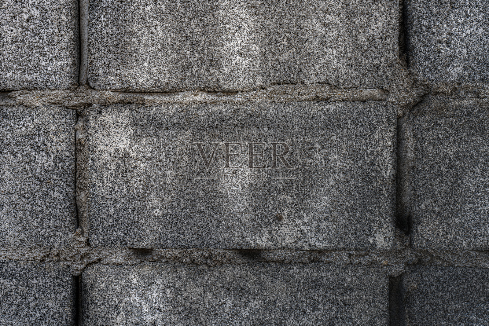 混凝土砌块墙的背景和纹理。照片摄影图片