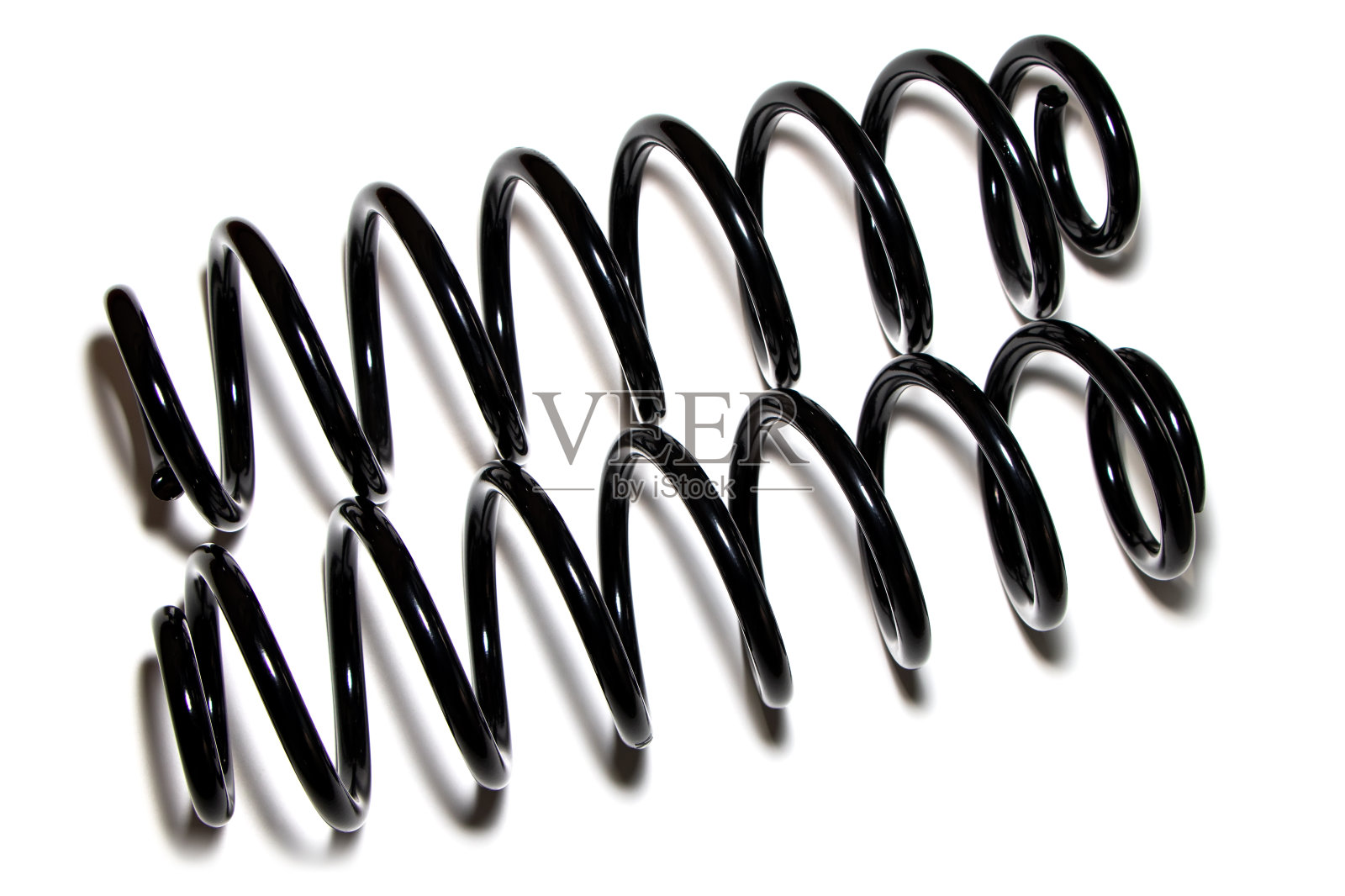 黑色金属弹簧孤立在白色背景上照片摄影图片