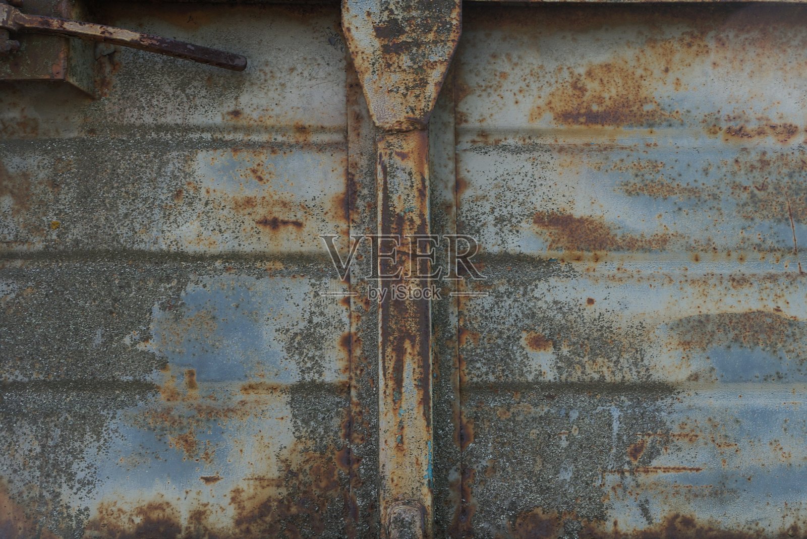 肮脏的灰色旧铁墙上的金属质感照片摄影图片