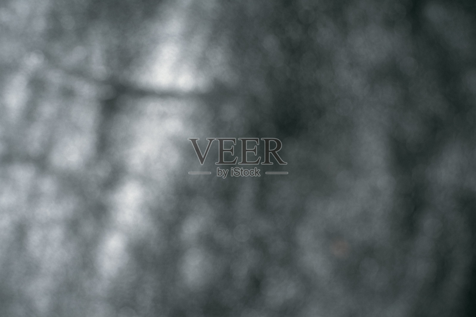 黑色皮革背景与丰富的纹理细节。特写的黑色皮革。模糊的背景照片摄影图片